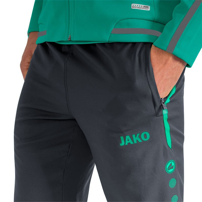 JAKO-6519-24-5 Leisure Pants Striker 2.0 Anthracite/Turquoise Zipped Side Pockets